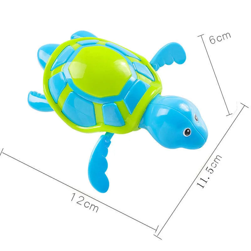 Plastic swimming turtle bath toy with brain game component for baby water play