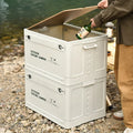 Large green plastic storage box with a wooden lid, showing foldable sides.