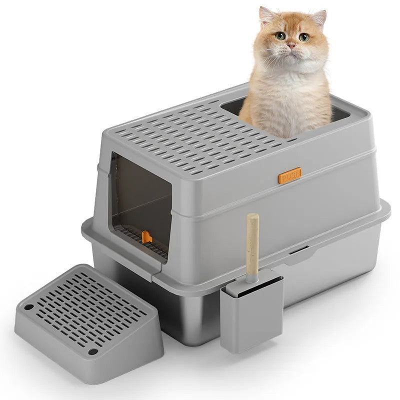 Grey enclosed cat litter box with a front pedal and removable top lid.