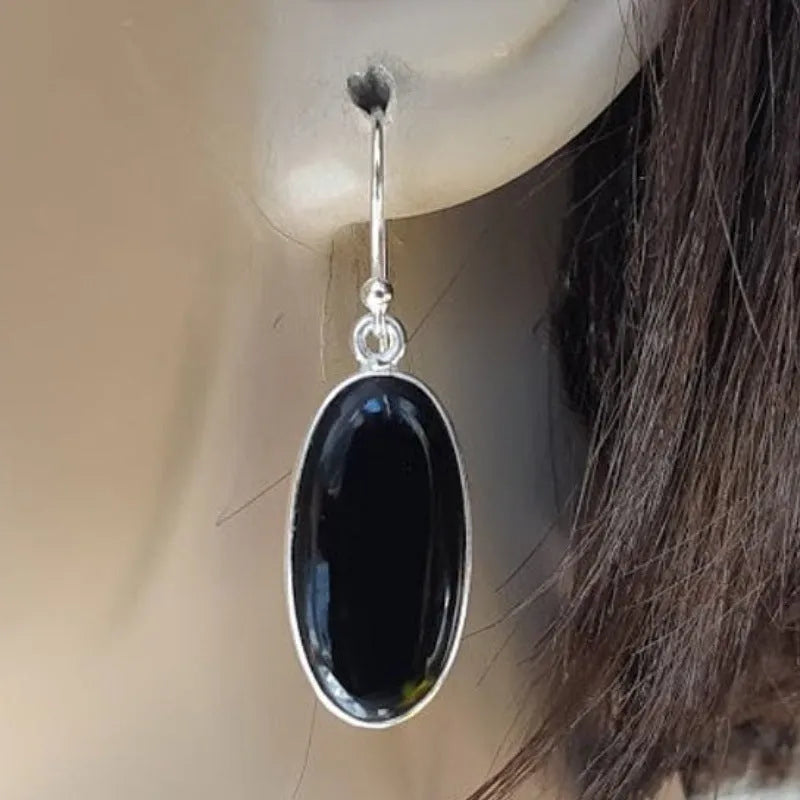 Women's geometric earrings with oval black agate pendant on 925 sterling silver with electroplated finish
