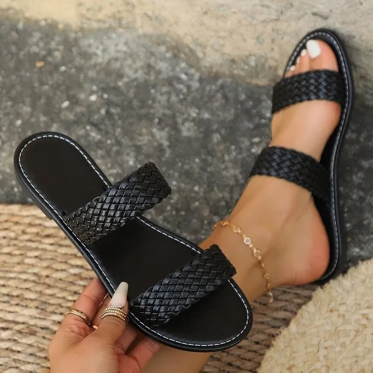 Plus size women's woven beach slippers in gold colour with a synthetic leather upper and PVC sole.