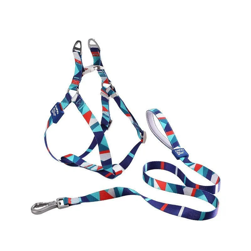 Blue polyester dog harness vest with attached haulage rope set on a white background.