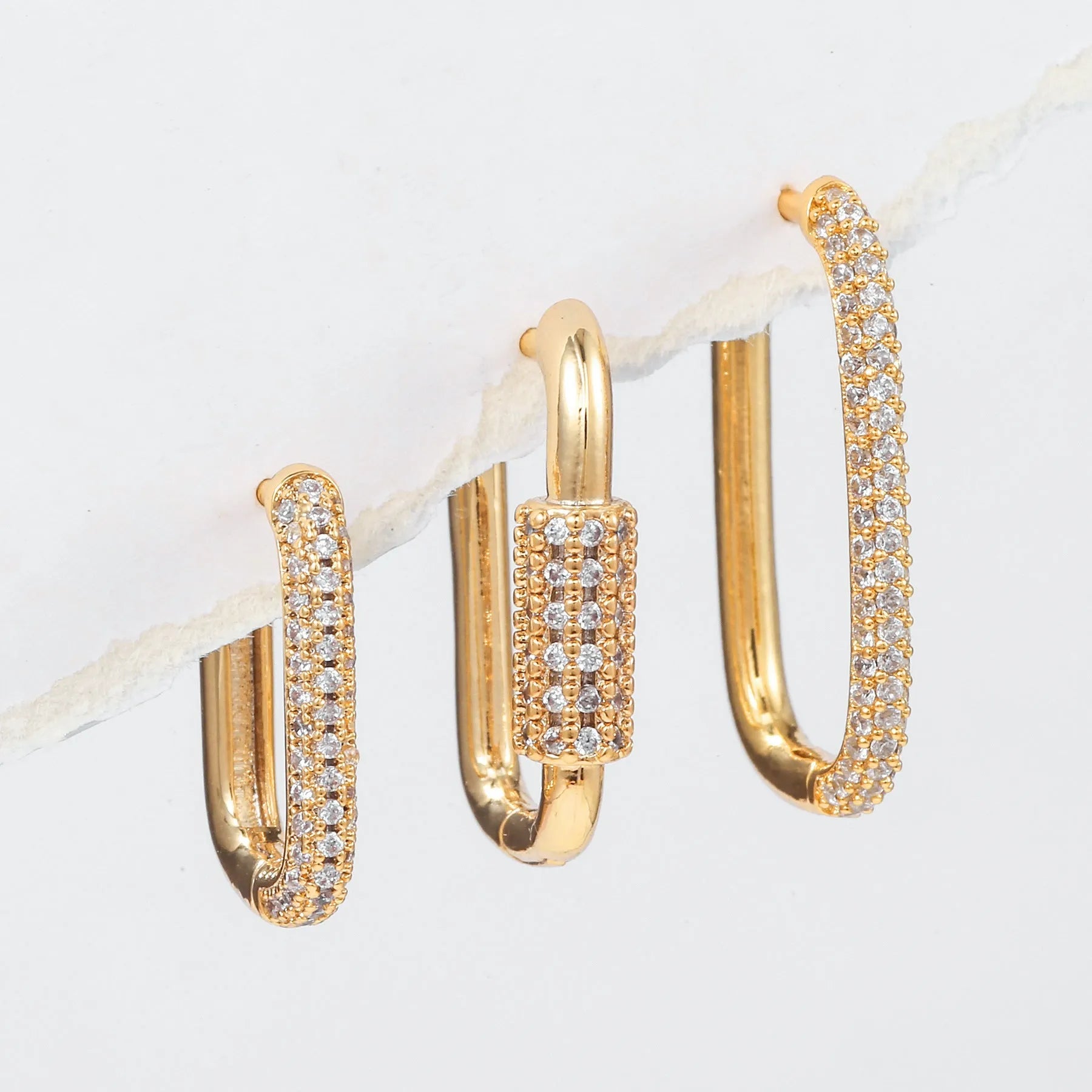 Geometric three-piece copper ear clip set with micro inlaid zircon detailing in gold or white finish