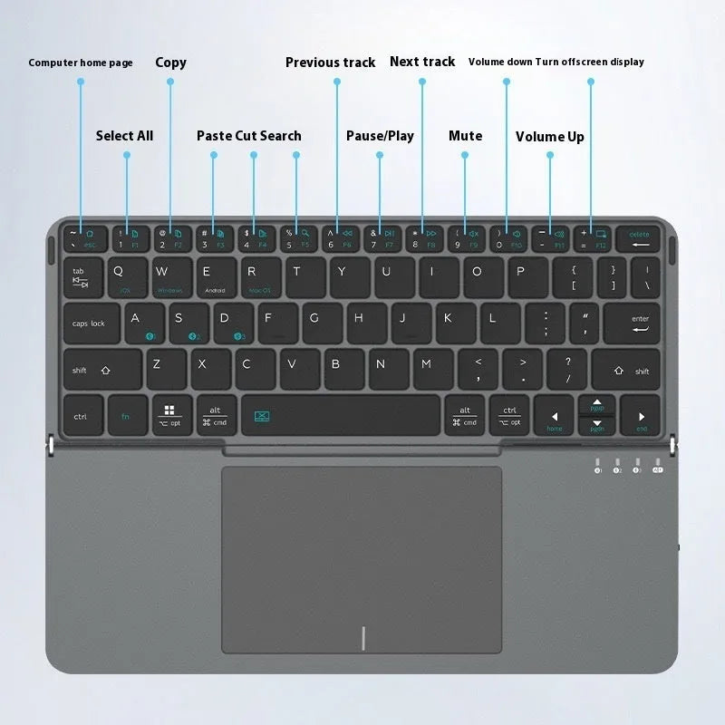Grey wireless Bluetooth folding keyboard for mobile phones and tablets on a table.