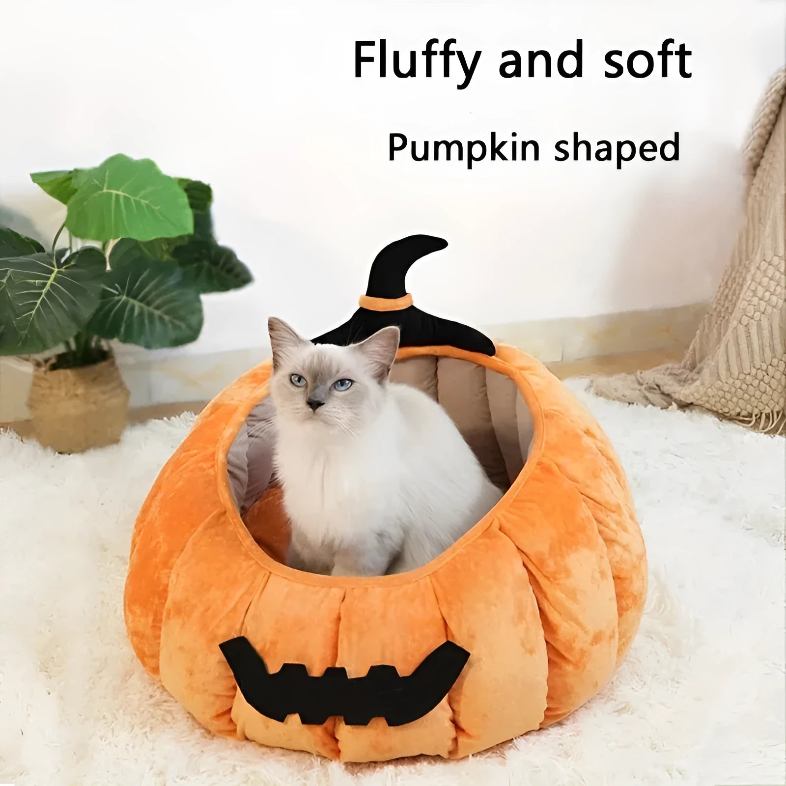 Halloween pumpkin-shaped cat bed with cartoon devil design in soft plush material