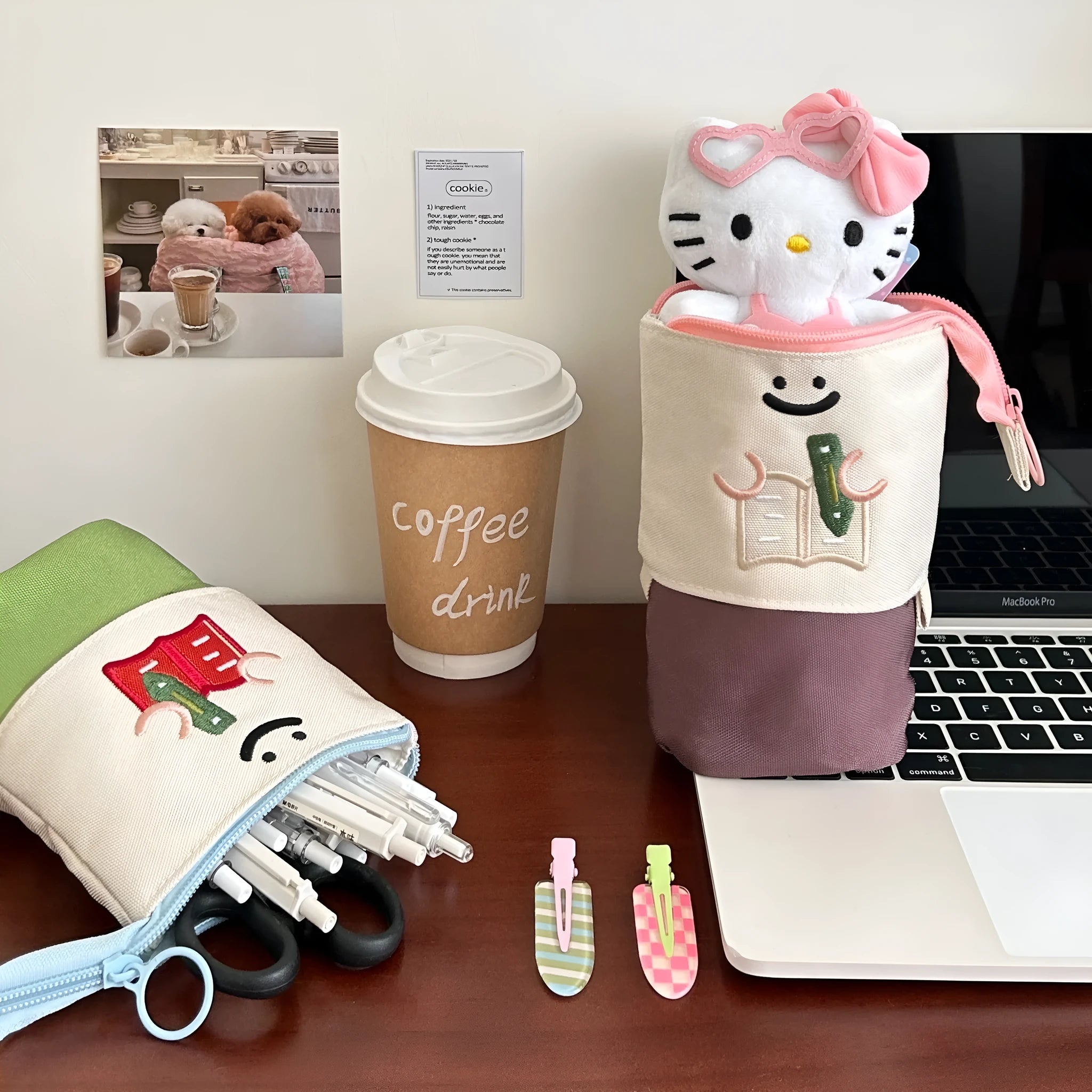 Brown cartoon pattern collapsible pencil case with zipper closure showing interior space