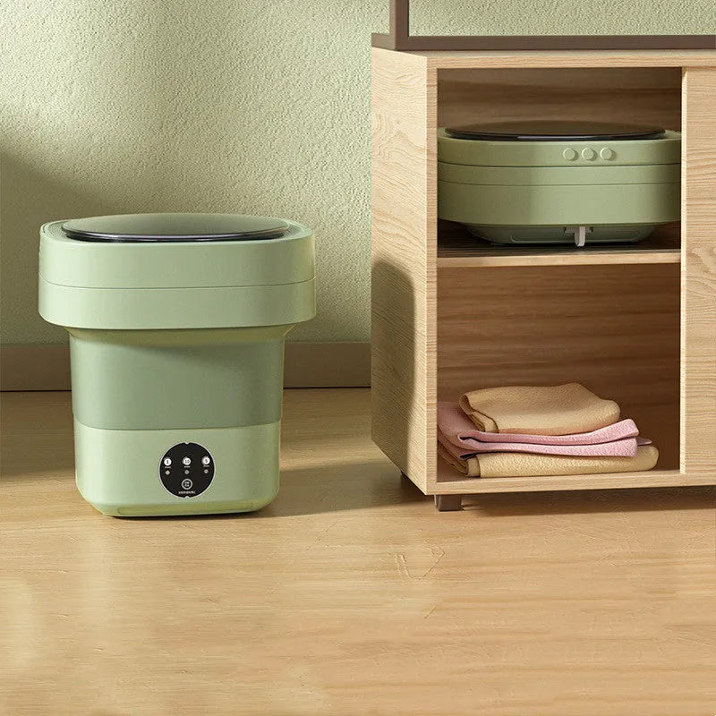 Portable folding washing machine in pine green colour with drain hose and basket