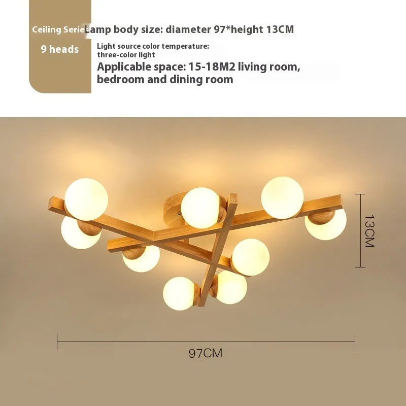 Wooden style modern Nordic ceiling light with three neutral light heads.