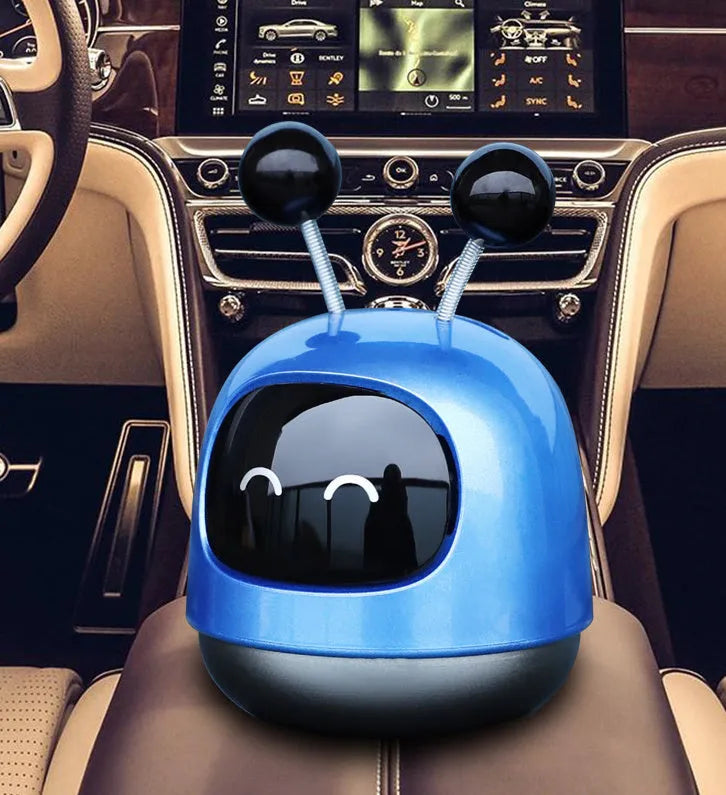 Creative robot car design car vent air freshener aromatherapy decoration in blue, grey, or red.
