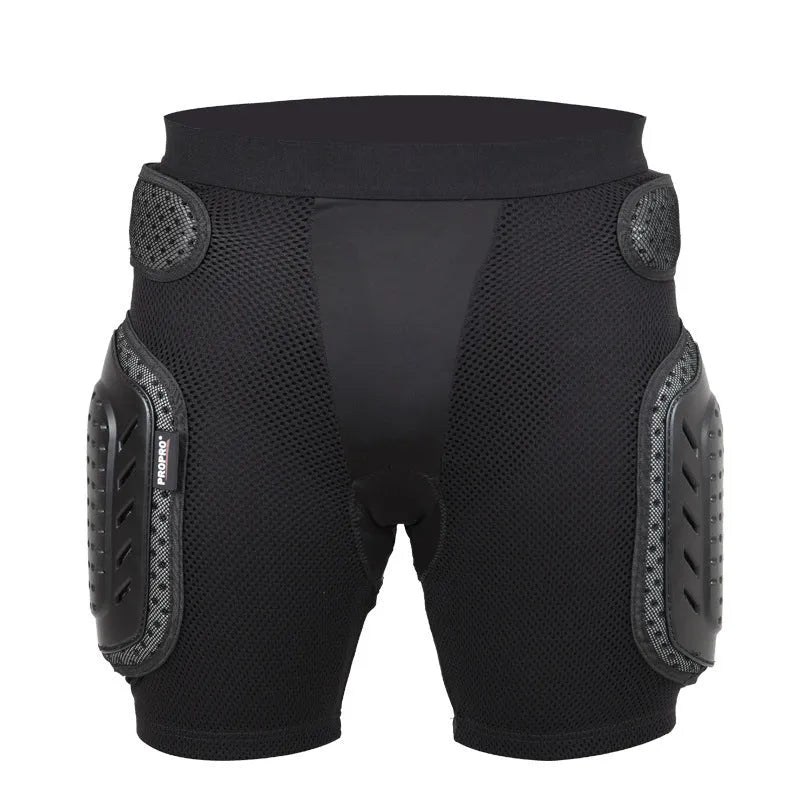 Black cycling hip protection pants with integrated pad, shown laid flat.