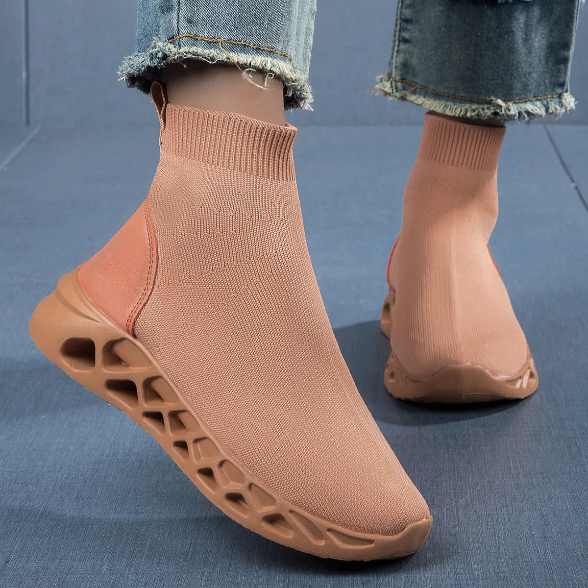 Women's low-top casual mesh slip-on shoe in terracotta colour on a white background.