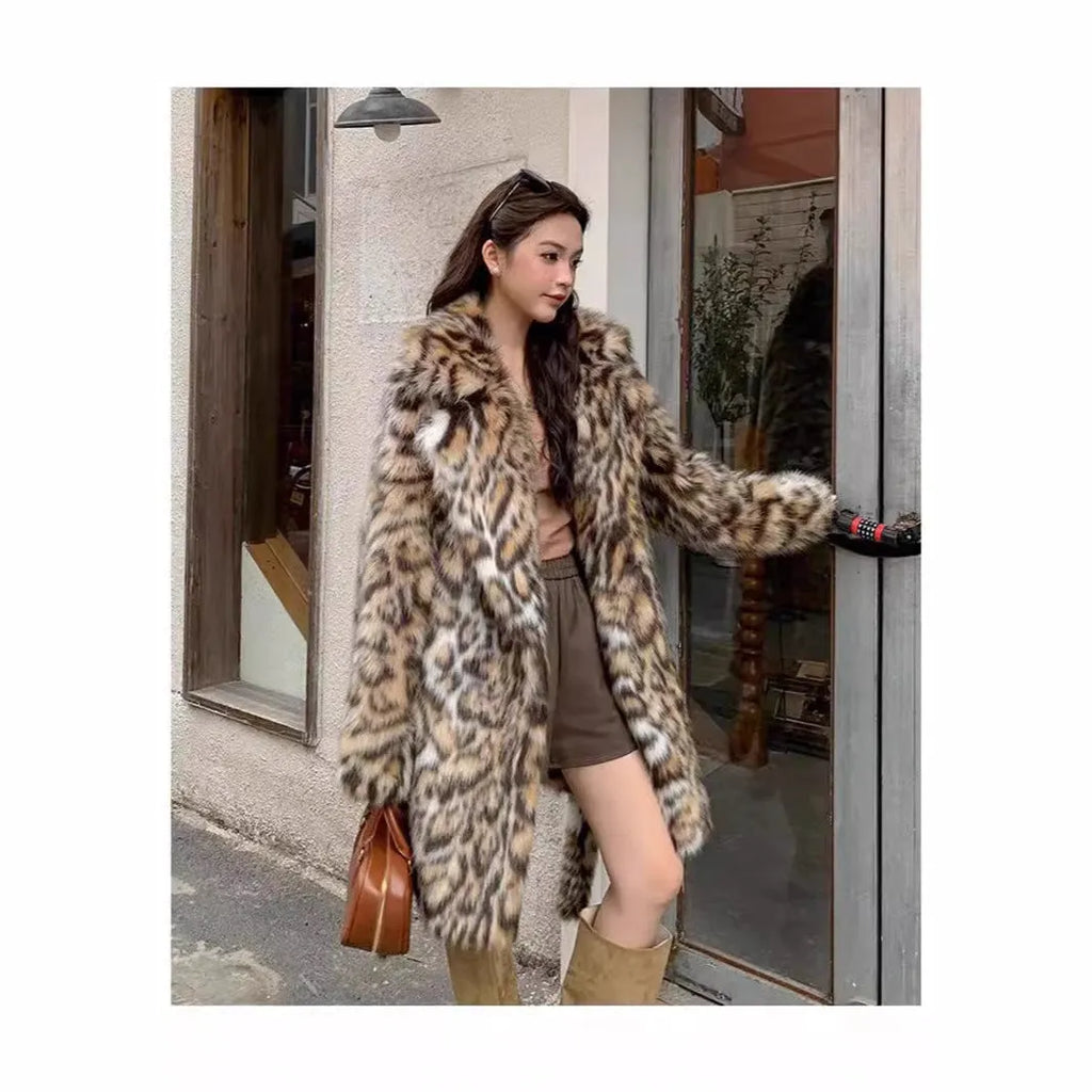 Faux fur coat with detachable collar in street fashion style showing long length and practical pockets