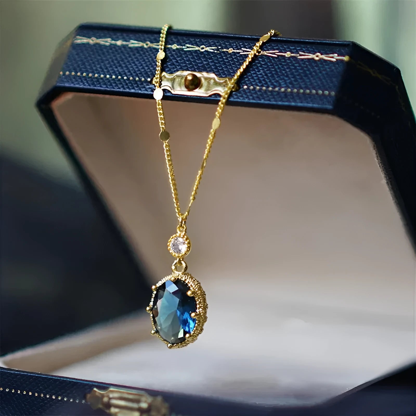 Geometric French retro style copper necklace with a gold electroplated finish.