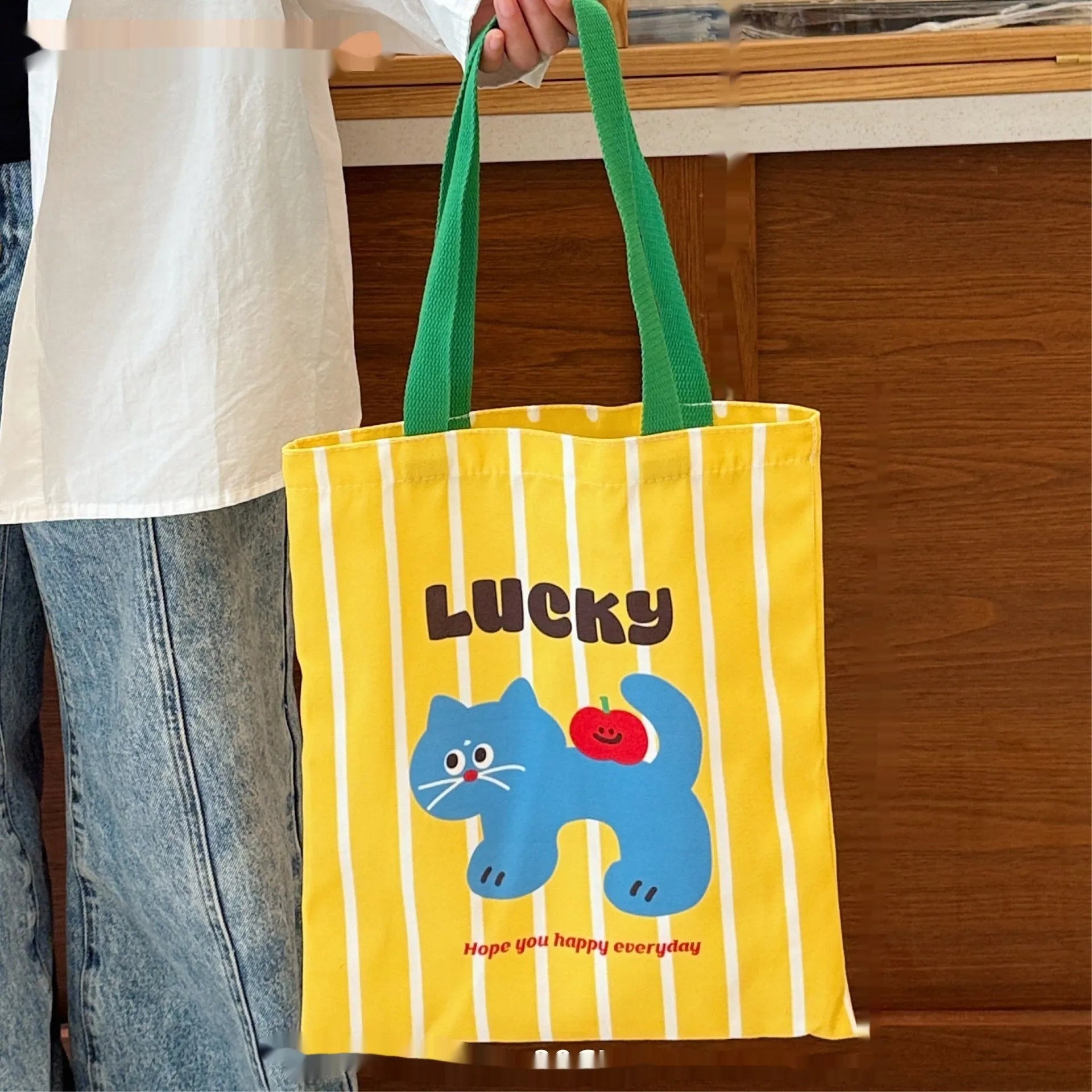 Cartoon kitten print canvas tote bag showing dimensions of 30cm wide by 36cm tall.