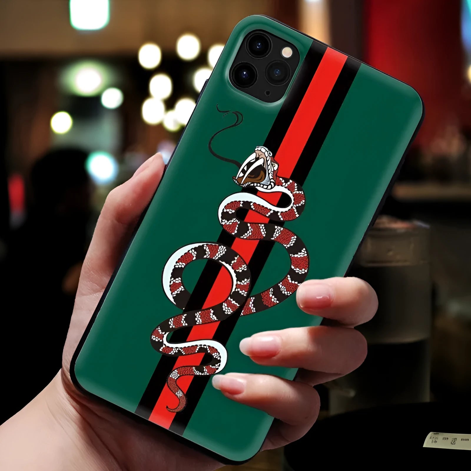 Black frosted silicone iPhone case with cartoon snake UV painting design on back