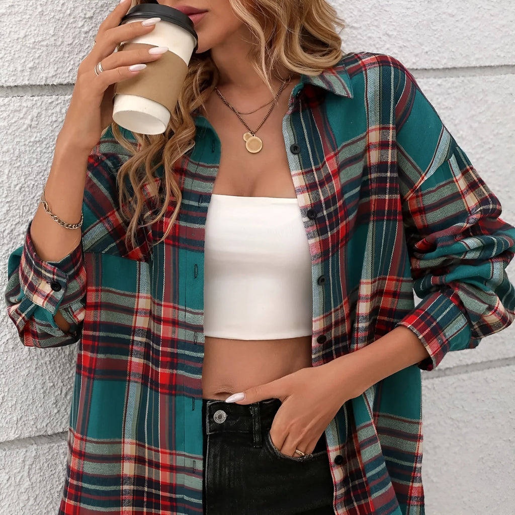 A woman's loose fit cotton plaid shirt in a retro style, shown in a choice of black, green, or purple colours.
