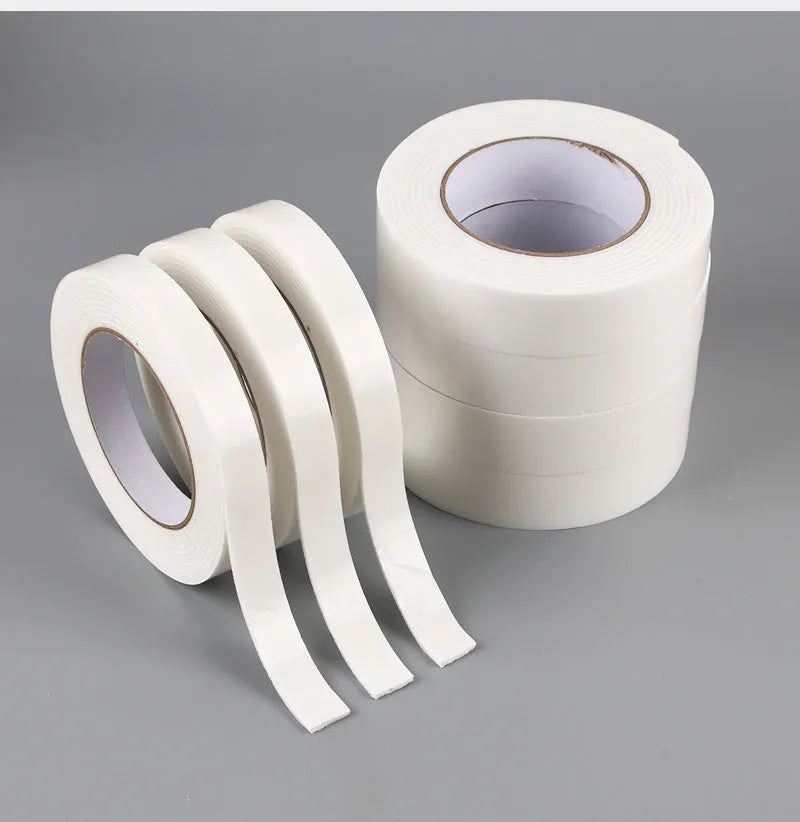 Foam double-sided adhesive tape roll showing 3mm thickness with measurements for 15mm, 18mm, and 30mm width options