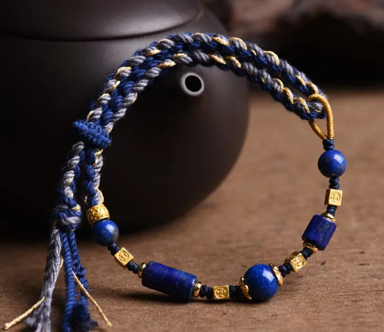 Hand woven DIY watch bracelet with lapis lazuli coloured rope and flexible wire in an ethnic style.