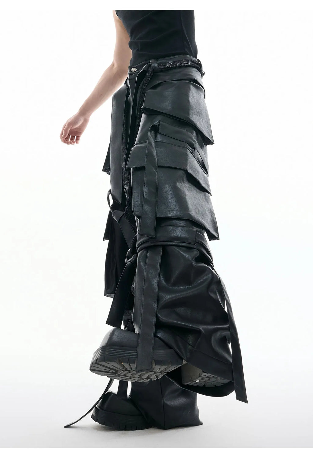 Black loose fit leather trousers with quilted stitching detail and multiple pockets