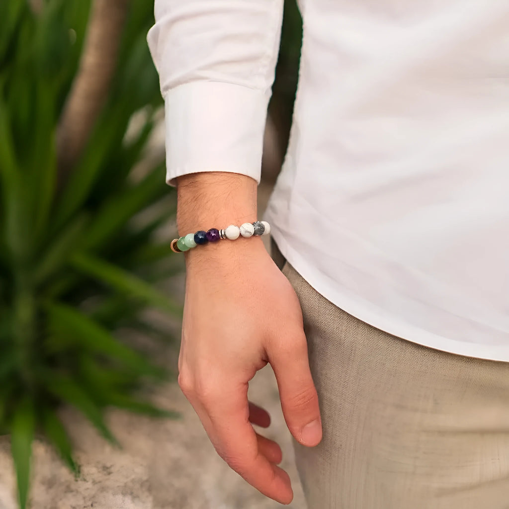 Women's flat knot braided bracelet hand-woven from aquamarine stone with geometric patterns.