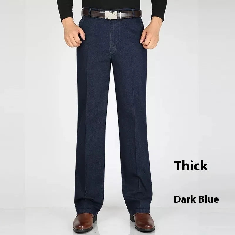 Men's high waist loose fit blue denim jeans on a neutral background