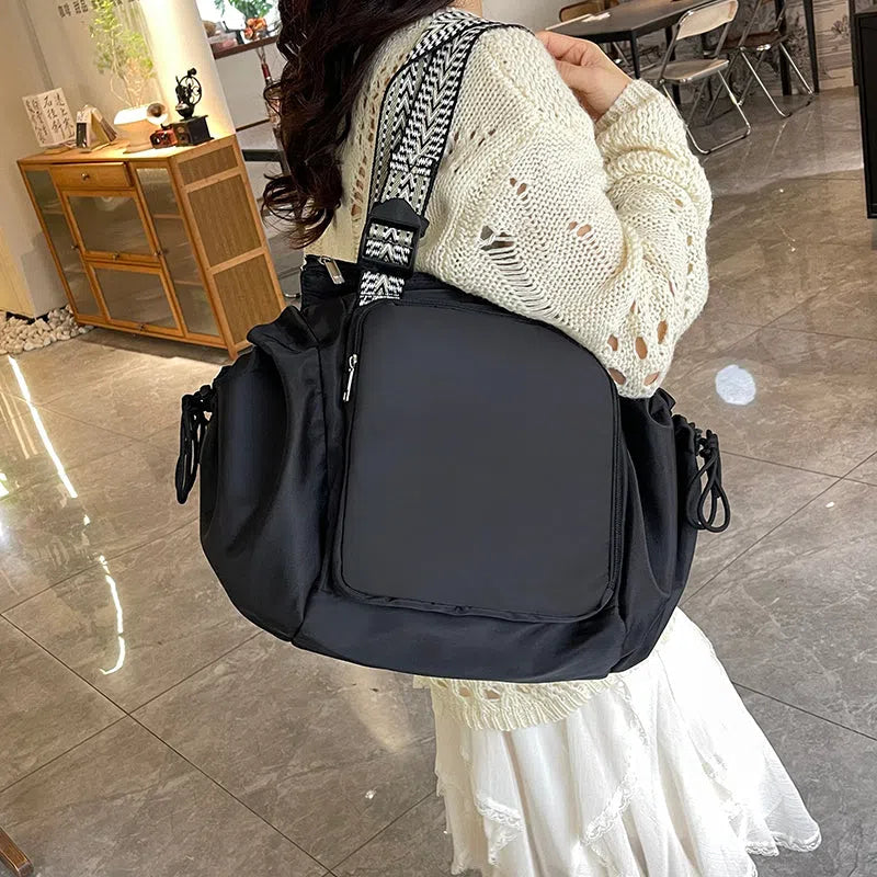 Nylon mommy bag in large capacity tote style, available in multiple colours for travel and daily use
