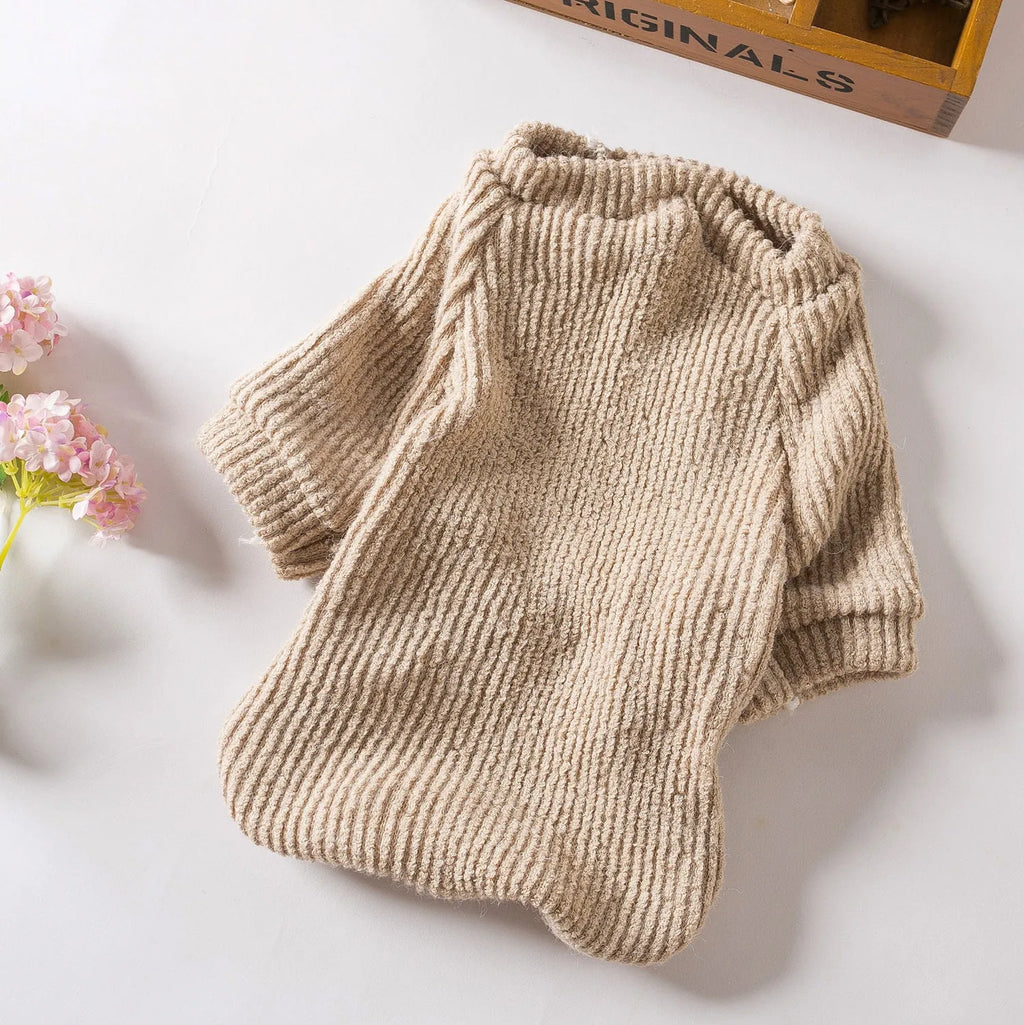 Brown cloth sweater pullover on a small dog, suitable for Bichon or Pomeranian breeds.