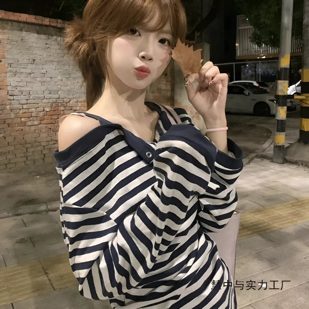 Dark blue women's long-sleeved oversized T-shirt with Korean style embroidery and stripe details.