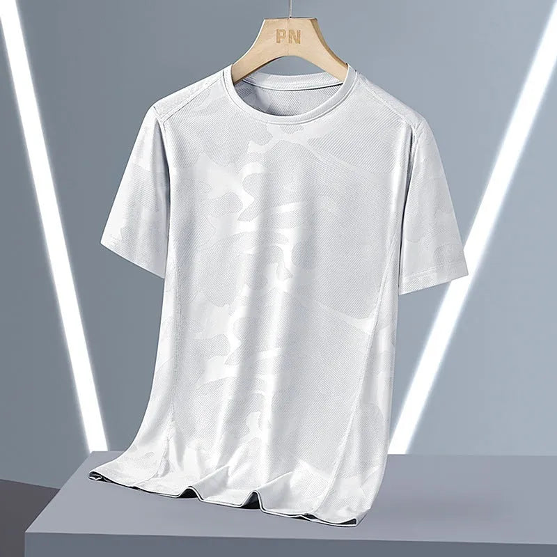 Plus size men's camouflage print short sleeve top in nylon fabric on a hanger.