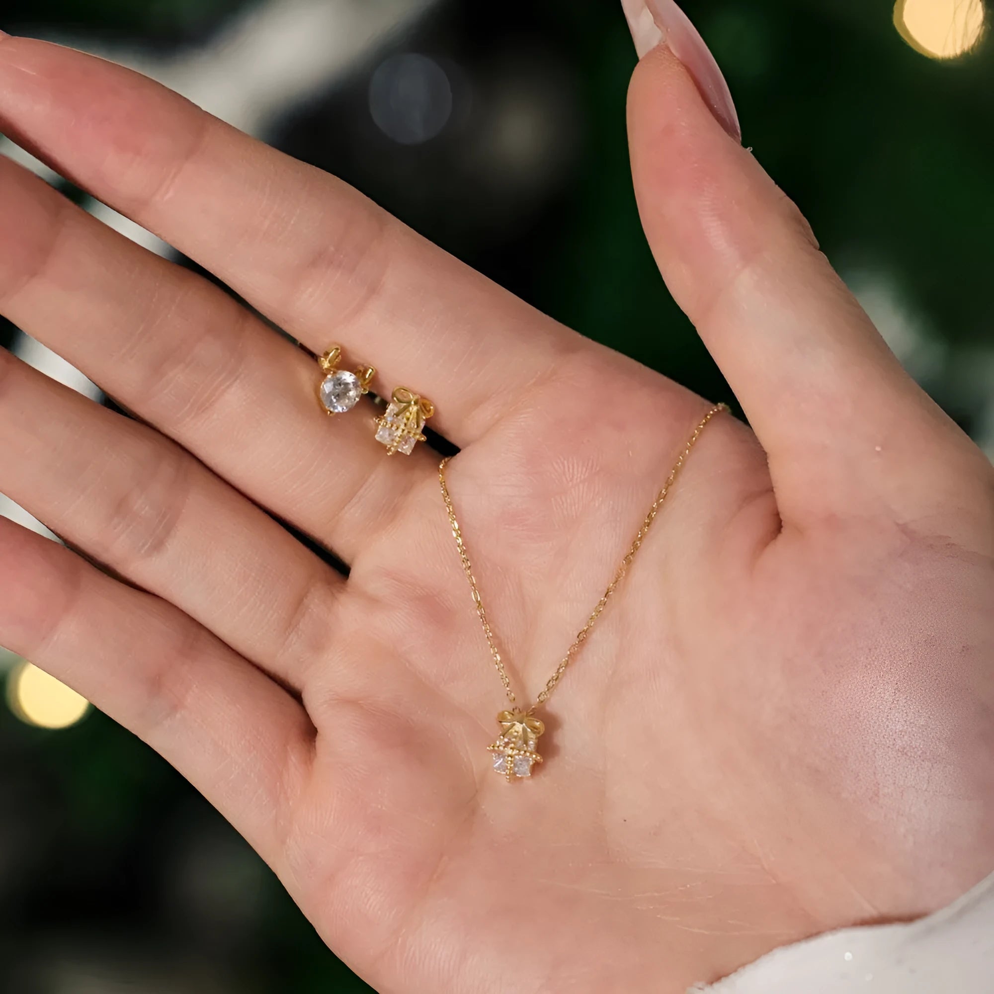 S925 sterling silver necklace and earring set with bear animal pendant on display, gold electroplated finish