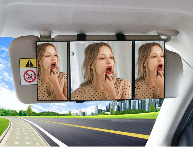 Silver portable folding car mirror shown both closed and open to double its length.
