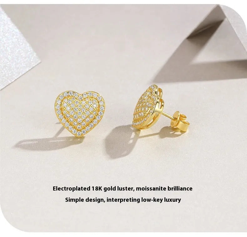 S925 silver gold moissanite heart-shaped stud earrings on white background