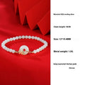 Magnolia flower jewellery set in sterling silver with inlaid green jade, showing necklace, bracelet, and stud earrings.