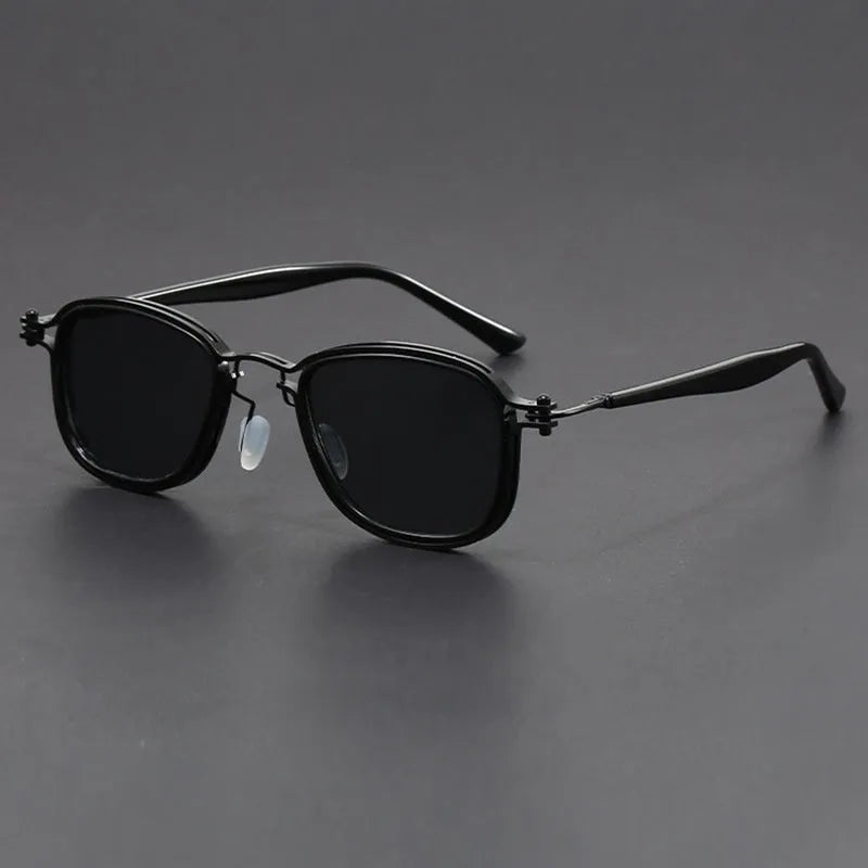 Retro square frame sunglasses with AC lenses in a Black Gold Full Gray colour finish.