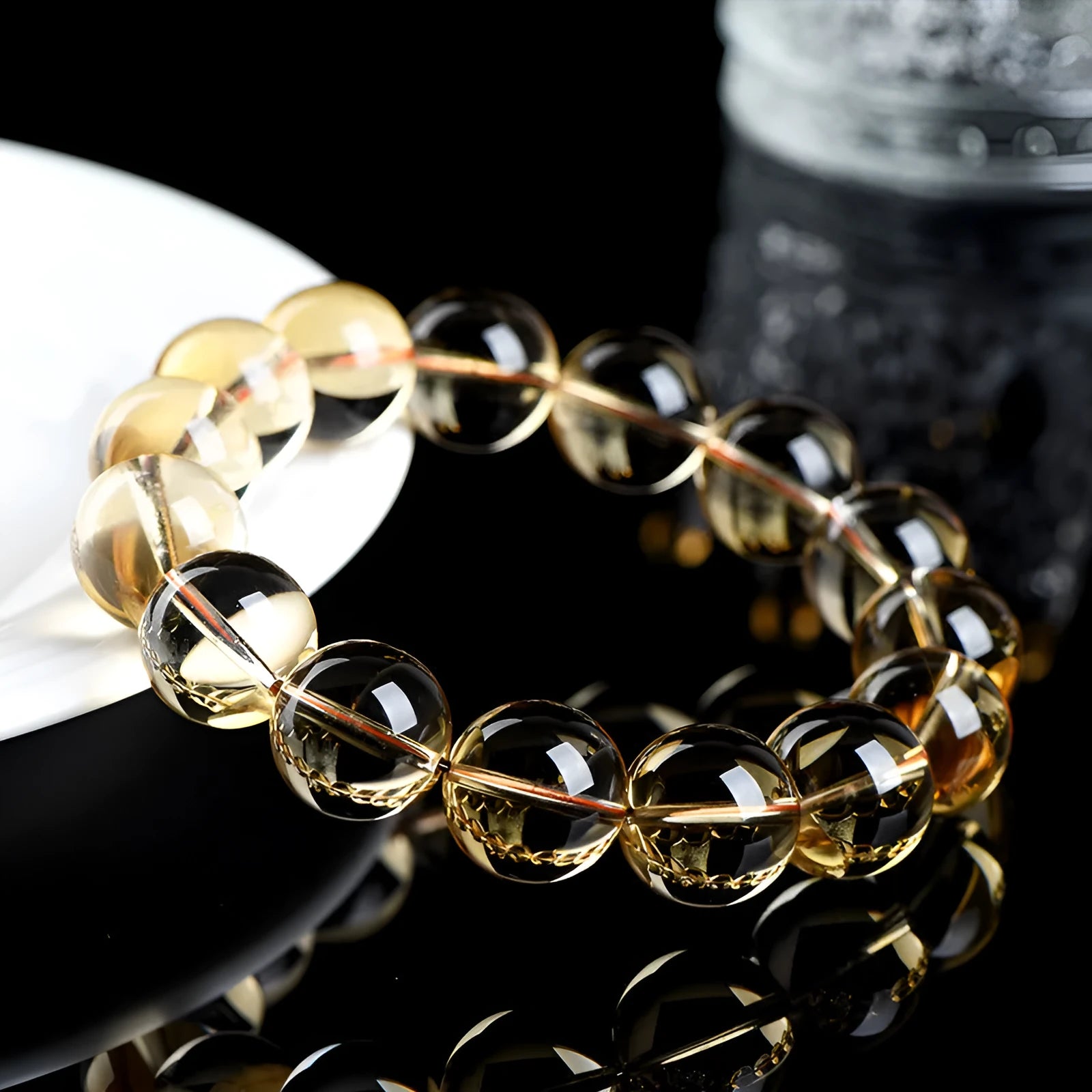 Natural citrine scattered beads ball bracelet showing polished stones on wrist.