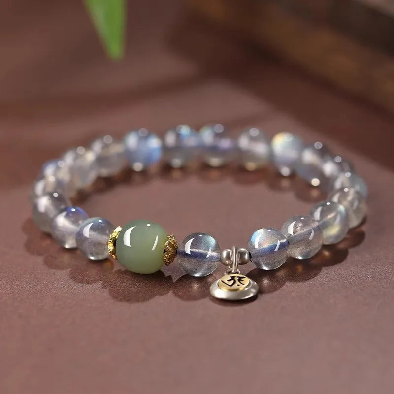 Moonstone Buddha beads bracelet with electroplated Guanyin mouse design on 8mm crystal bead
