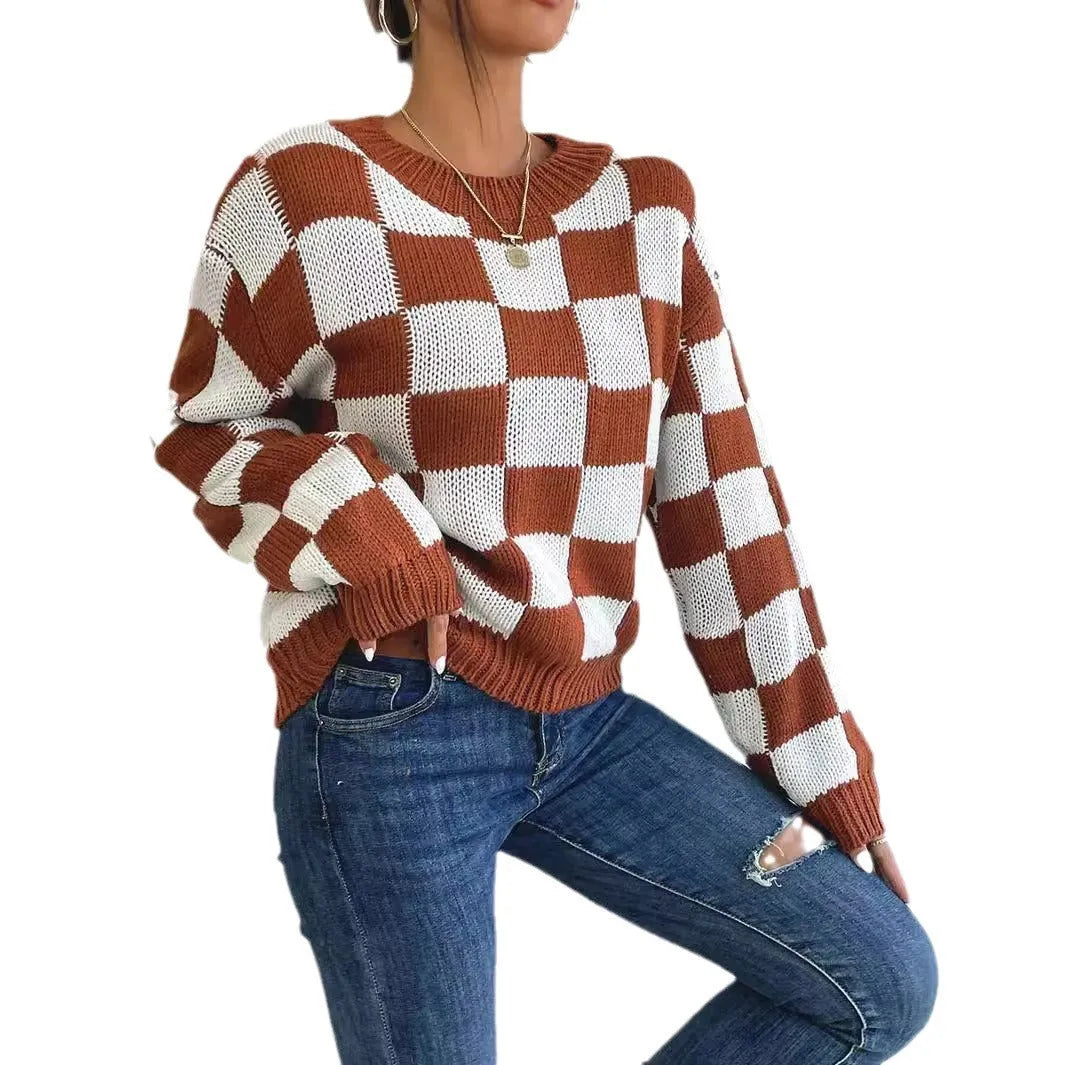 Dark brown loose pullover sweater with a chessboard plaid pattern and round neck.