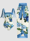 Women's printed chiffon two-piece swimsuit with attached hip skirt in a floral pattern.