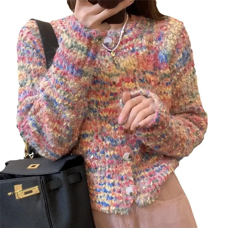 Rainbow pattern knitted cardigan in pink and green colours with toothbrush hair texture