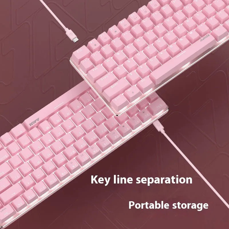82-key mechanical keyboard with white backlight and metal housing beside laptop