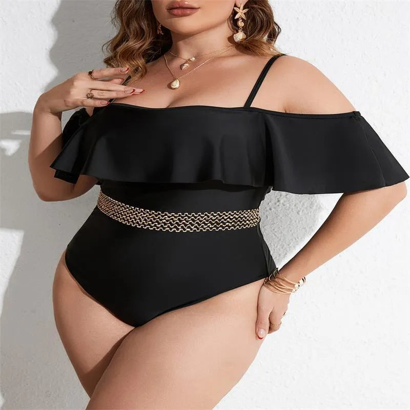 Black solid colour women's one-piece swimsuit on a hanger