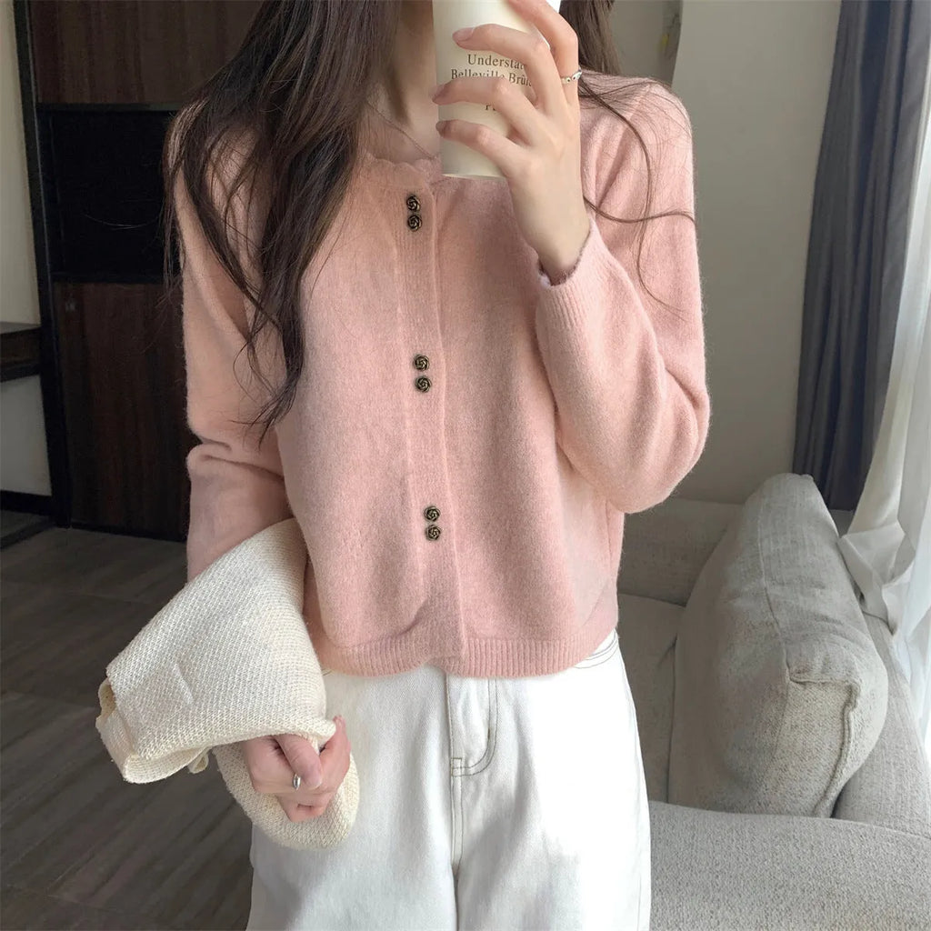 Women's long-sleeved acrylic cardigan sweater coat in free size, shown in a light colour.