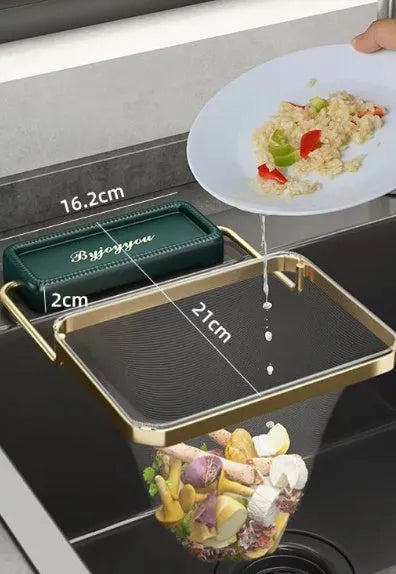 Dark green gold kitchen sink filter rack with suction cups and disposable mesh screen.