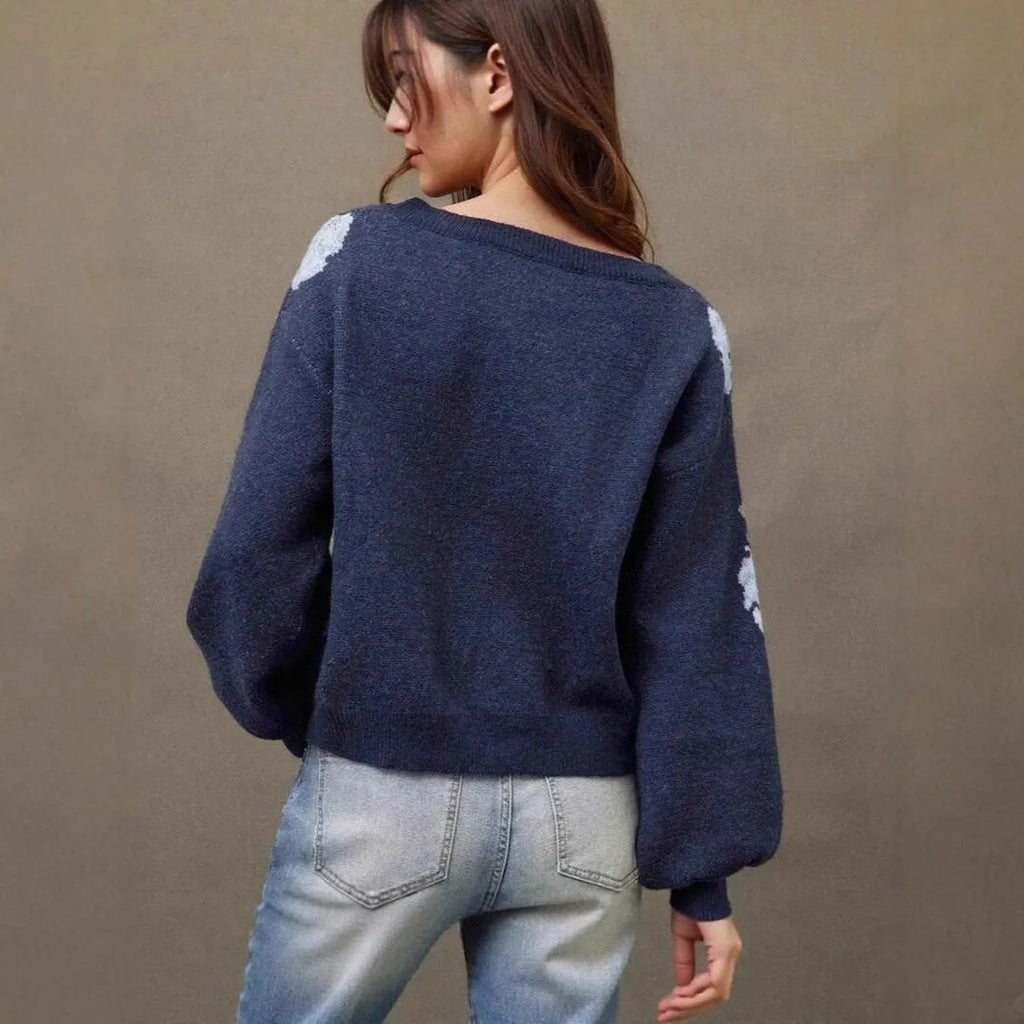 Sapphire blue women's pullover with floral jacquard pattern and off-neck design