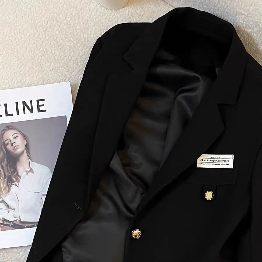 Black women's loose-fit polyester suit coat with long sleeves and pockets