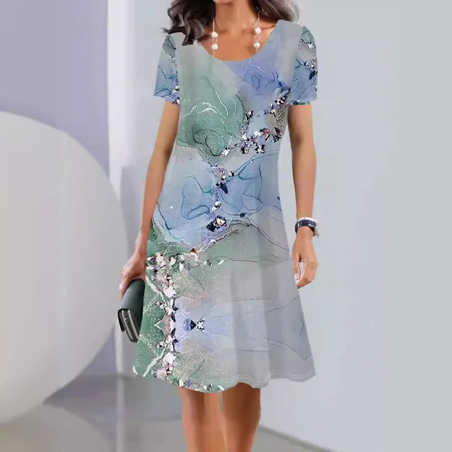 Light blue floral print mid-length A-line dress with short sleeves and a round neck.