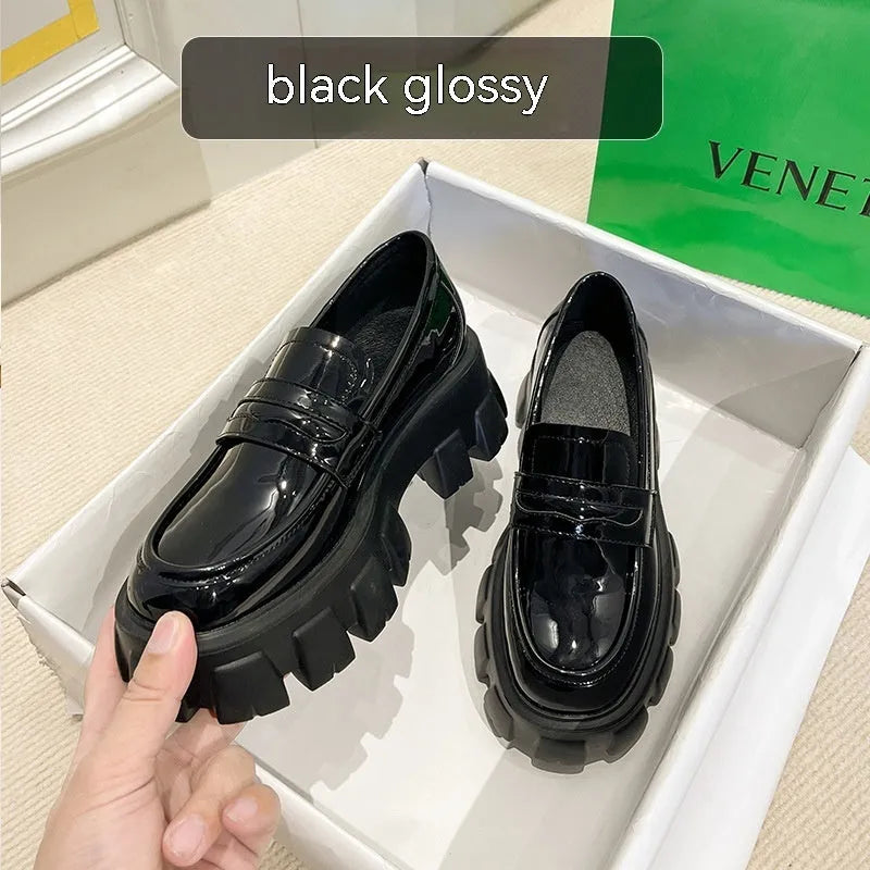 British style wide fit patent leather loafers with rubber sole and muffin base heel design
