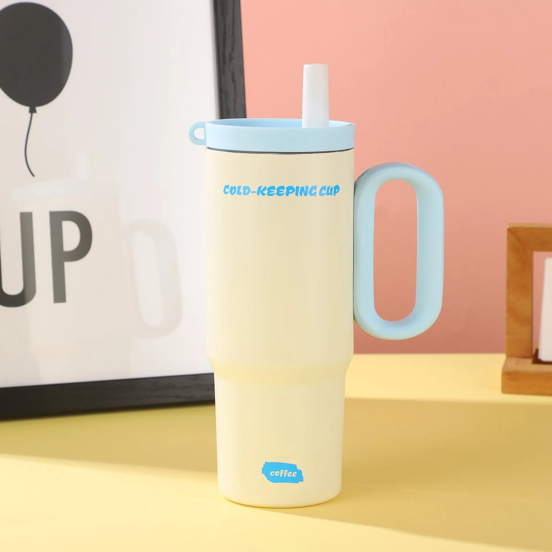 Large 700ml straw cup with a carry handle in assorted colours.
