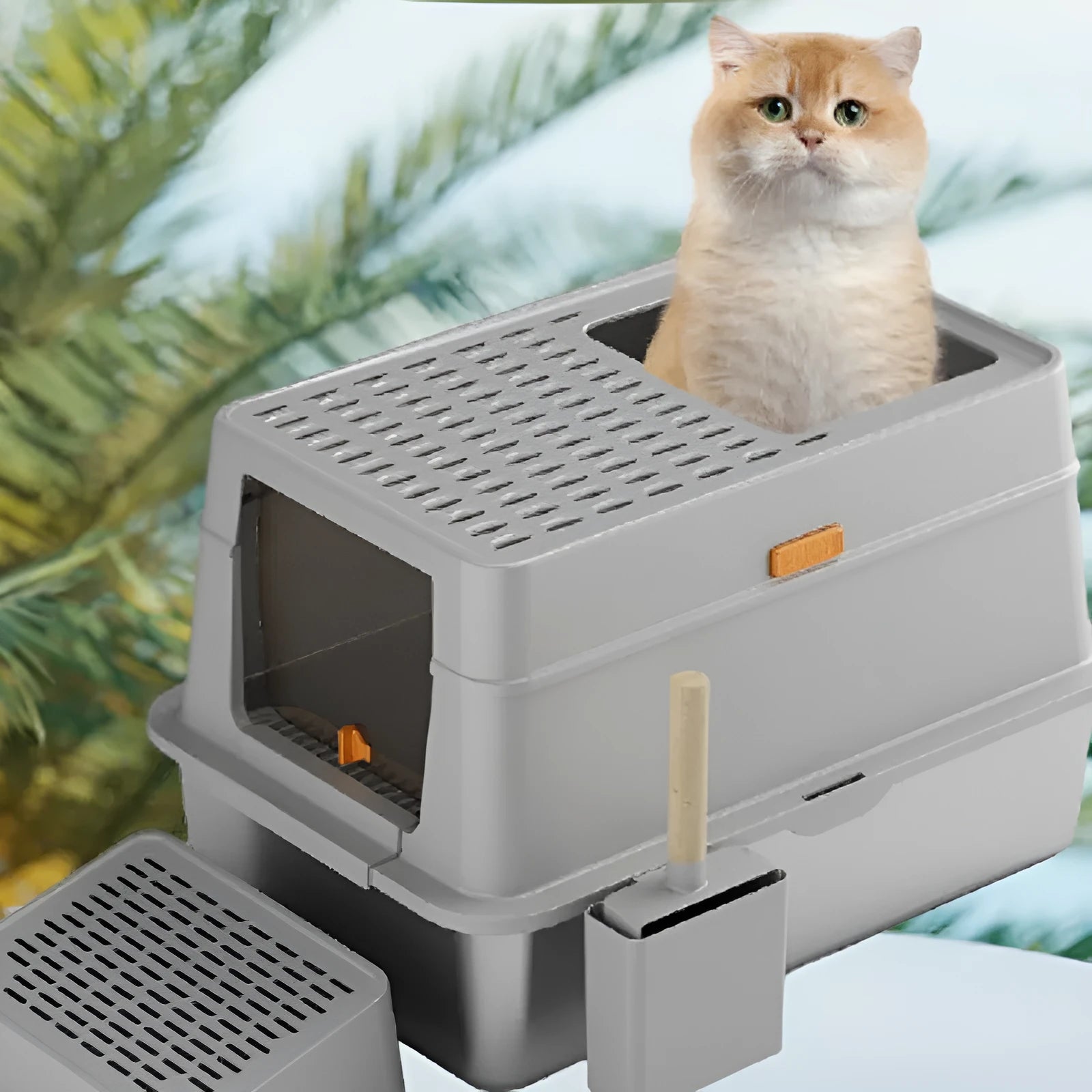 Grey enclosed cat litter box with a front pedal and removable top lid.