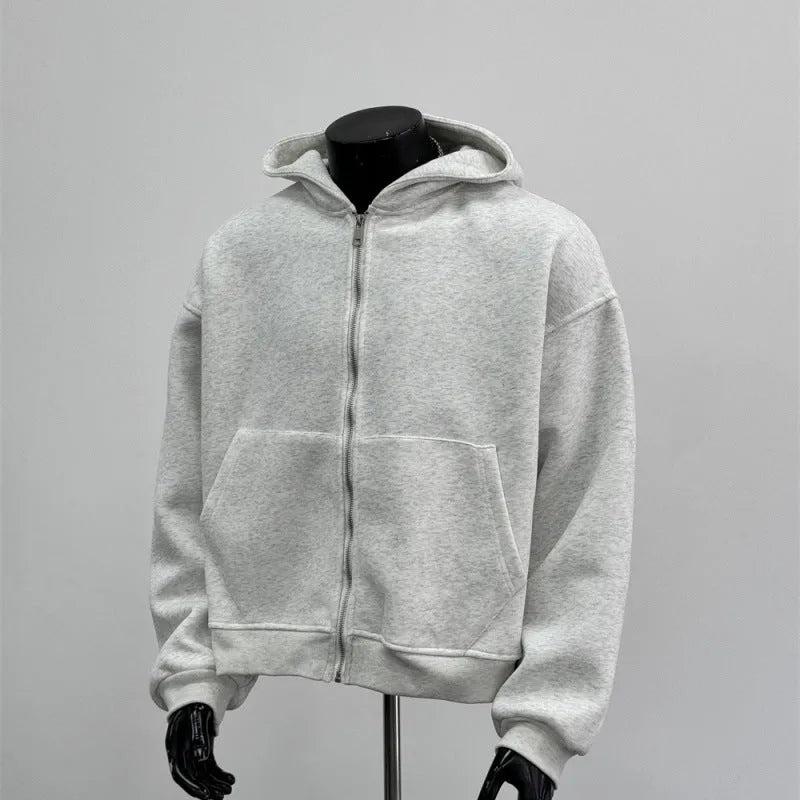 Light grey men's hoodie with backpack-style design on back, featuring a hood.